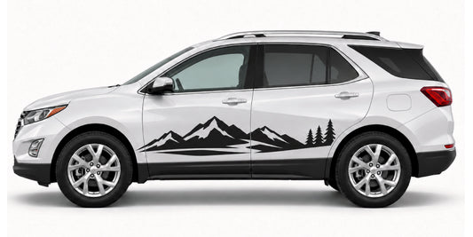 A white SUV shown in side profile on a light gray studio background, decorated with a black mountain and pine tree decal along the lower side panel.