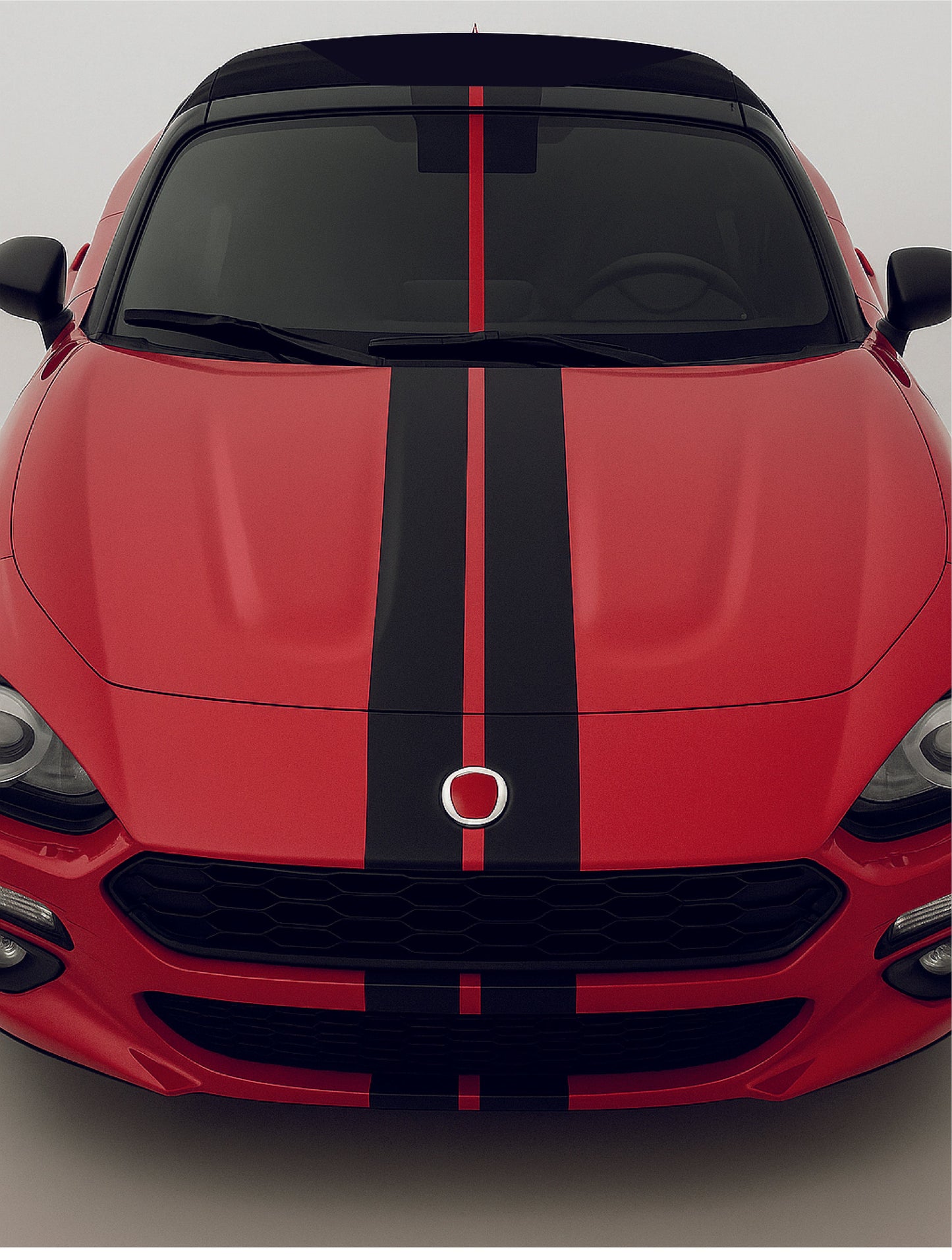 Red car with black stripes on a gray background
