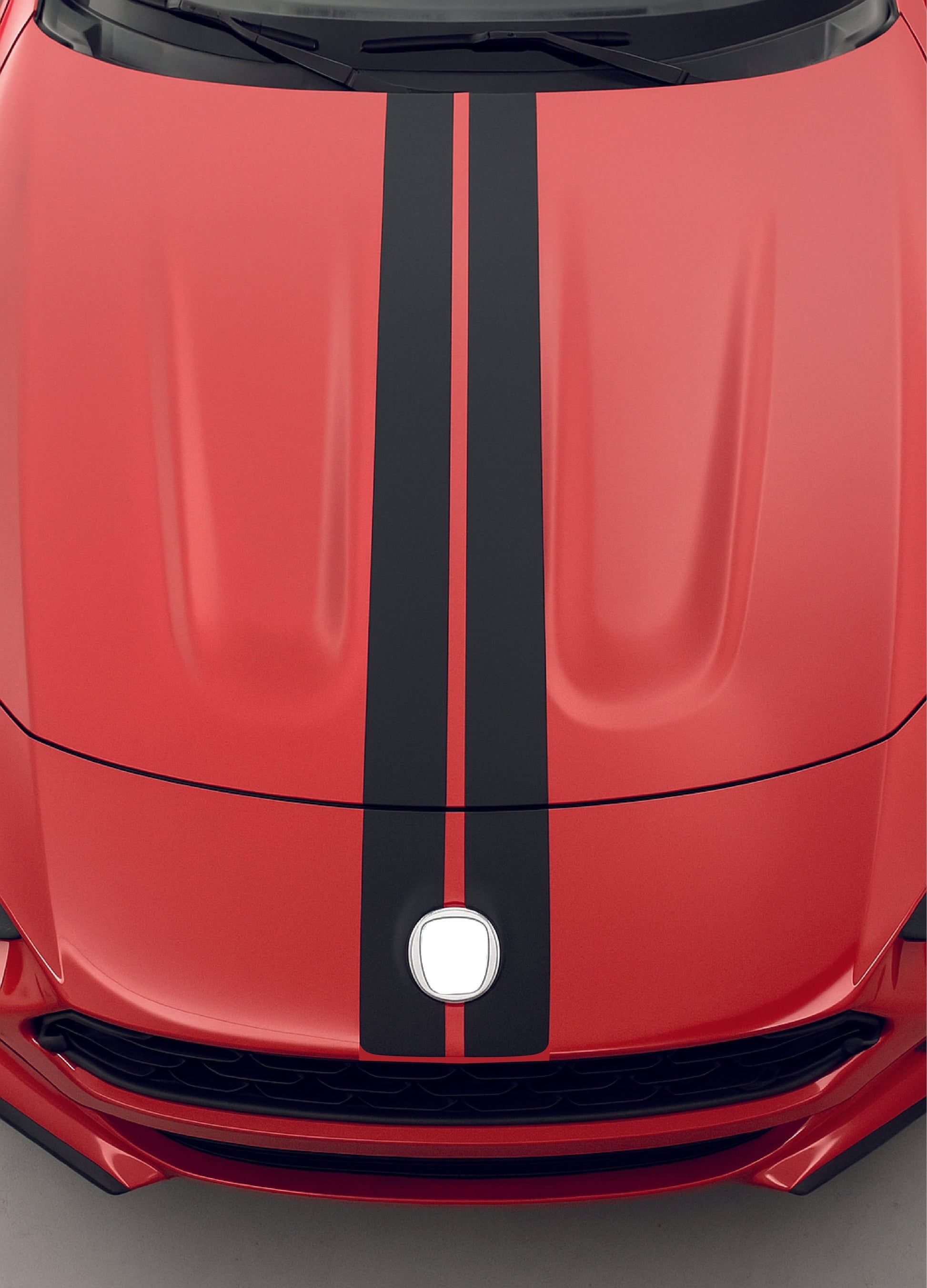 Red car hood with a black stripe on a gray background