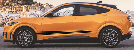 Orange SUV with black roof and side stripes on a scenic background