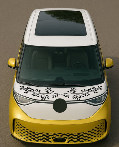 Yellow car with decorative black design on the front, on a brown background
