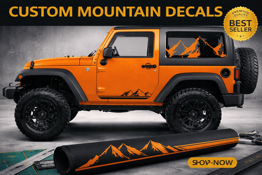 Orange Jeep with mountain decals on a gray background