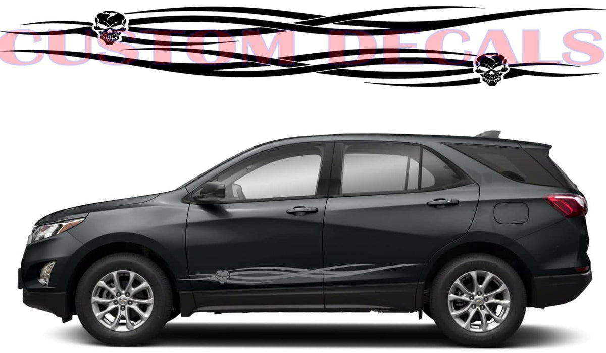 A side view of a black SUV on a white background, with a black custom decal graphic featuring skull and flame designs displayed above it.
