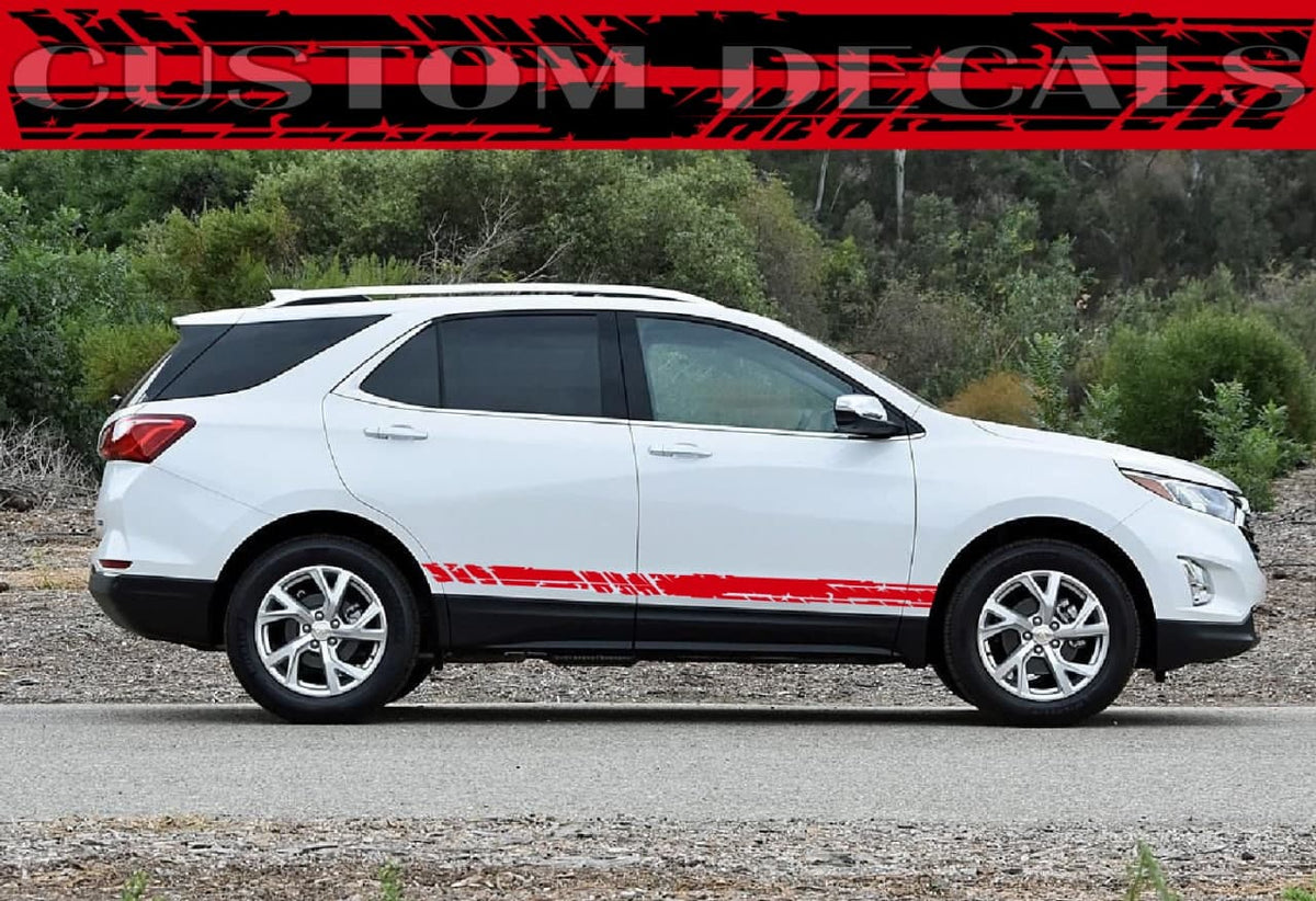 A white SUV shown in side profile on a gravel road with trees in the background, featuring a red custom vinyl decal stripe along the lower side panel. A red banner at the top reads 'CUSTOM DECALS'.