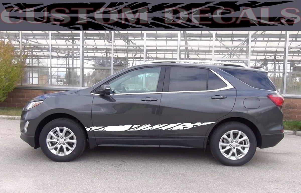 A dark gray SUV shown in side profile, parked outdoors in front of a glass building. A large semi-transparent watermark reading 'CUSTOM DECALS' is overlaid across the top.