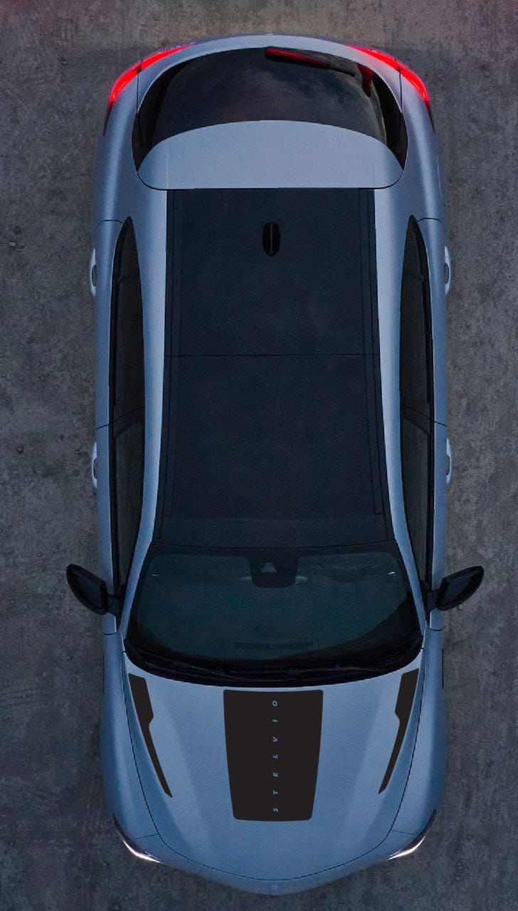 Custom vinyl hood decal on the side of Alfa Romeo Stelvio – high-quality automotive sticker with sharp tribal lines for sporty design upgrade.