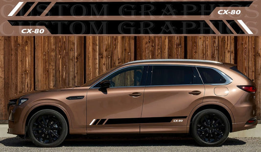 Bronze-colored SUV with 'Custom Graphics' branding on a wooden background