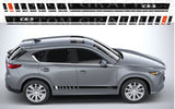 Silver SUV with 'TOM GRIMM' branding and 'CX-5' model on a white background
