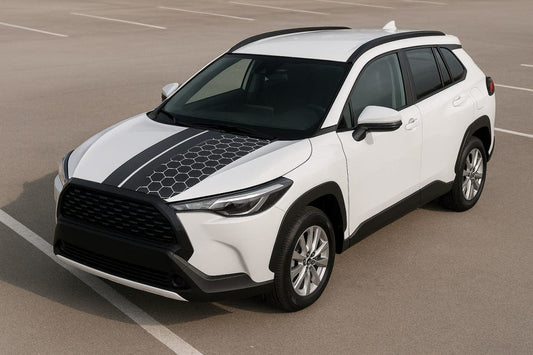 White SUV with black accents on a road