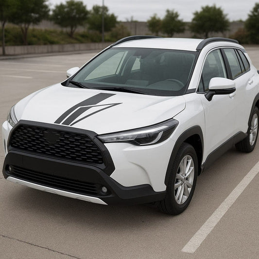 White SUV with black accents parked on a paved surface