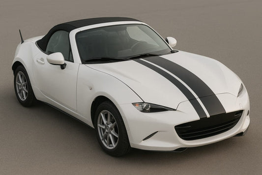 White convertible car with black stripes on a gray background