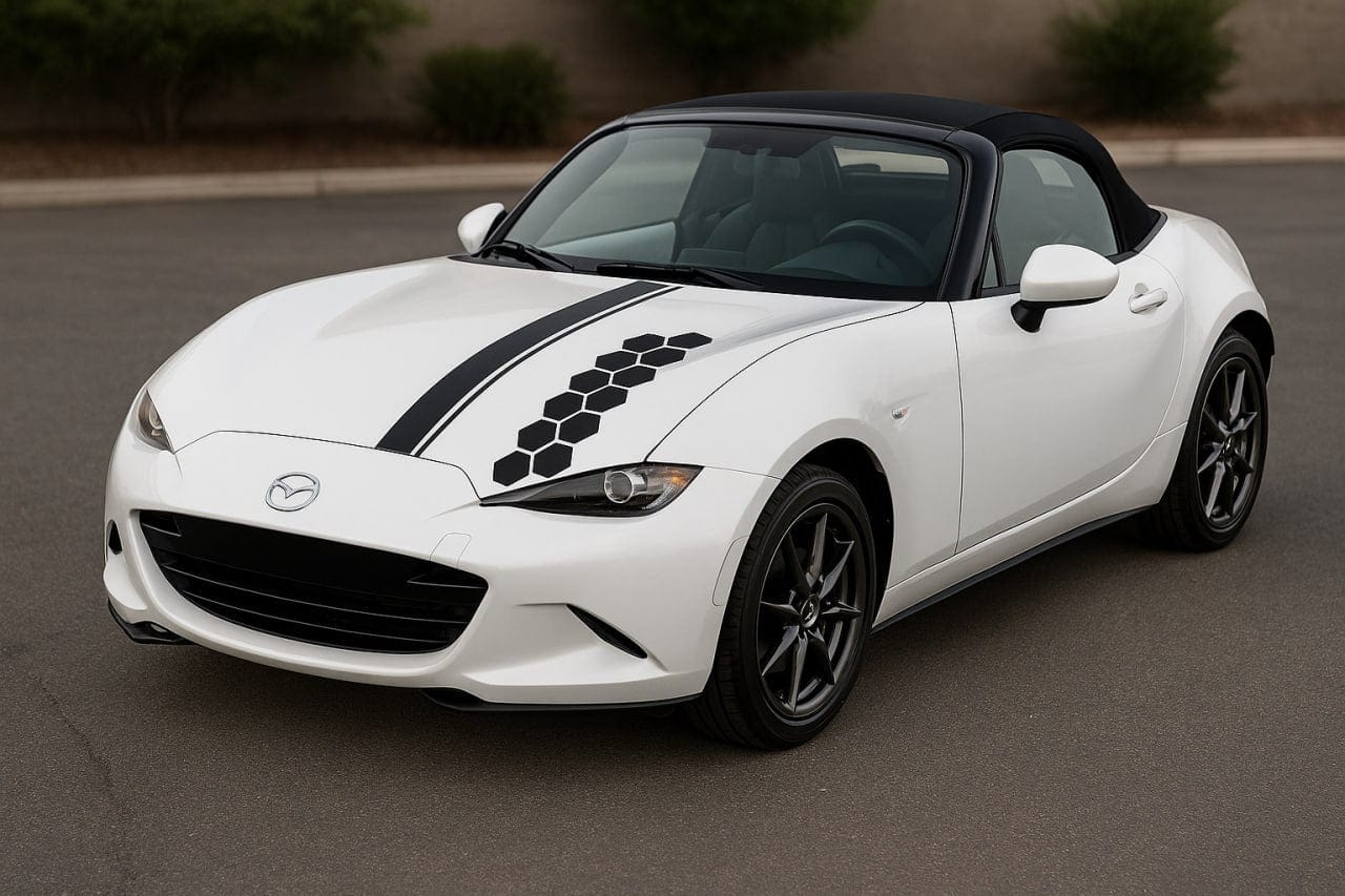 White convertible car with black interior on a road