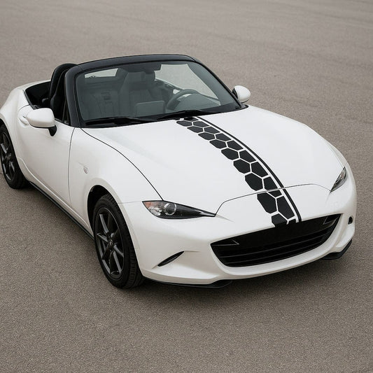 White convertible car with black honeycomb stripe on a gray road