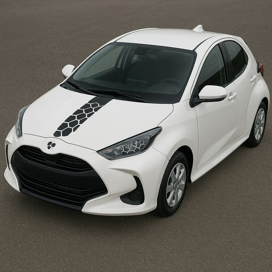 White car with black accents on a gray background