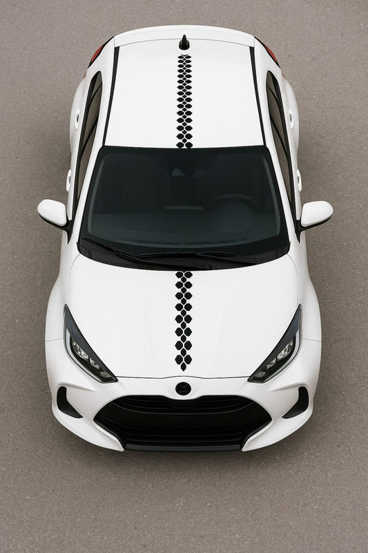 White car with black decorative stripe on a brown background