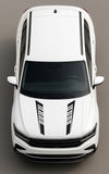 Top-down view of a white car with black accents on a gray background