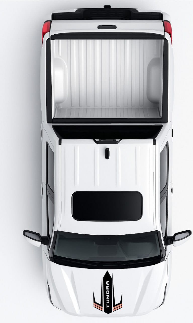 Top-down view of a white van with a black roof rack on a white background