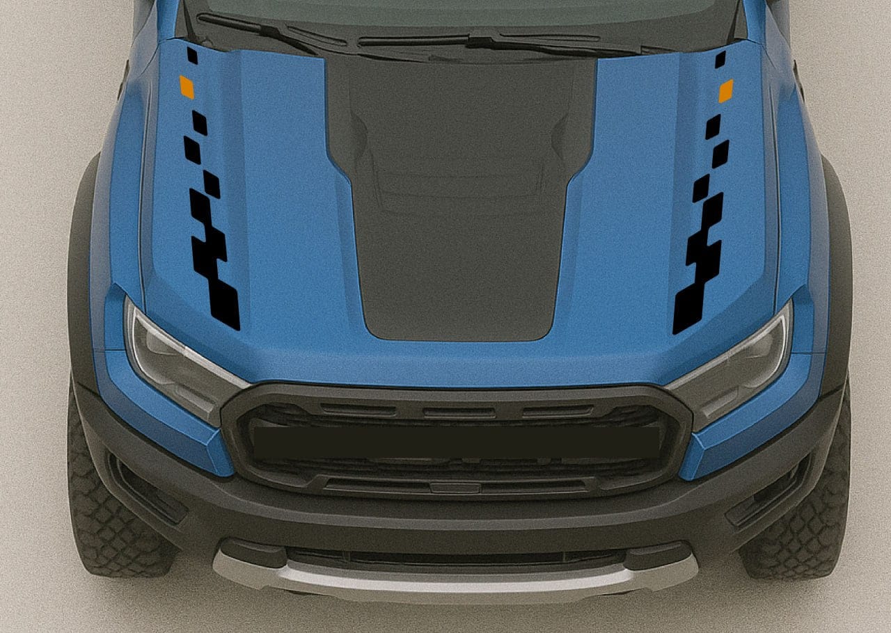 Top view of a blue and black truck with a checkered pattern on a gray background