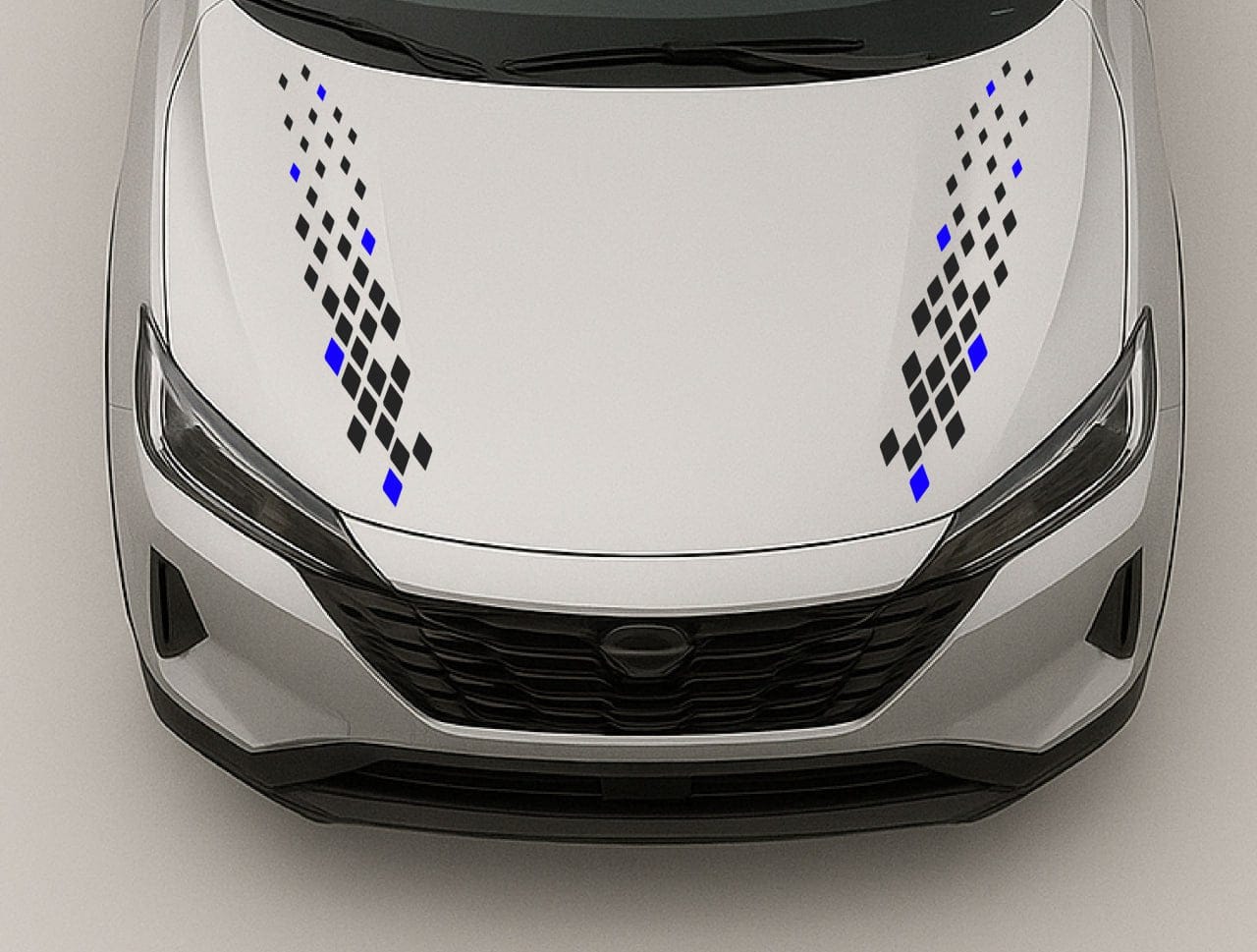 Car hood with black and blue geometric decals on a neutral background