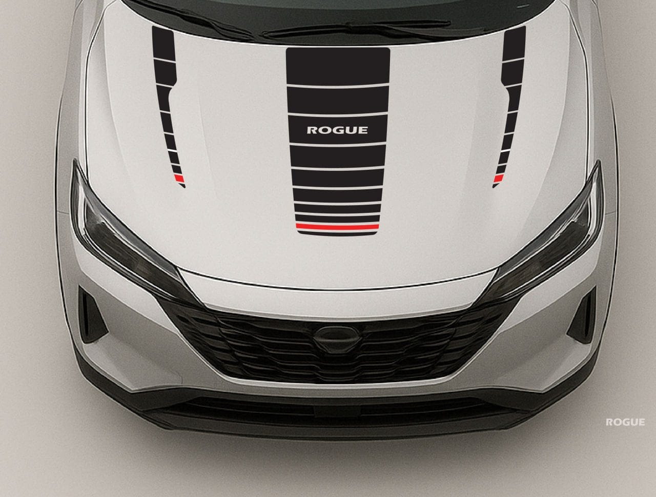 Nissan Rogue vehicle front with hood decal on a gray background