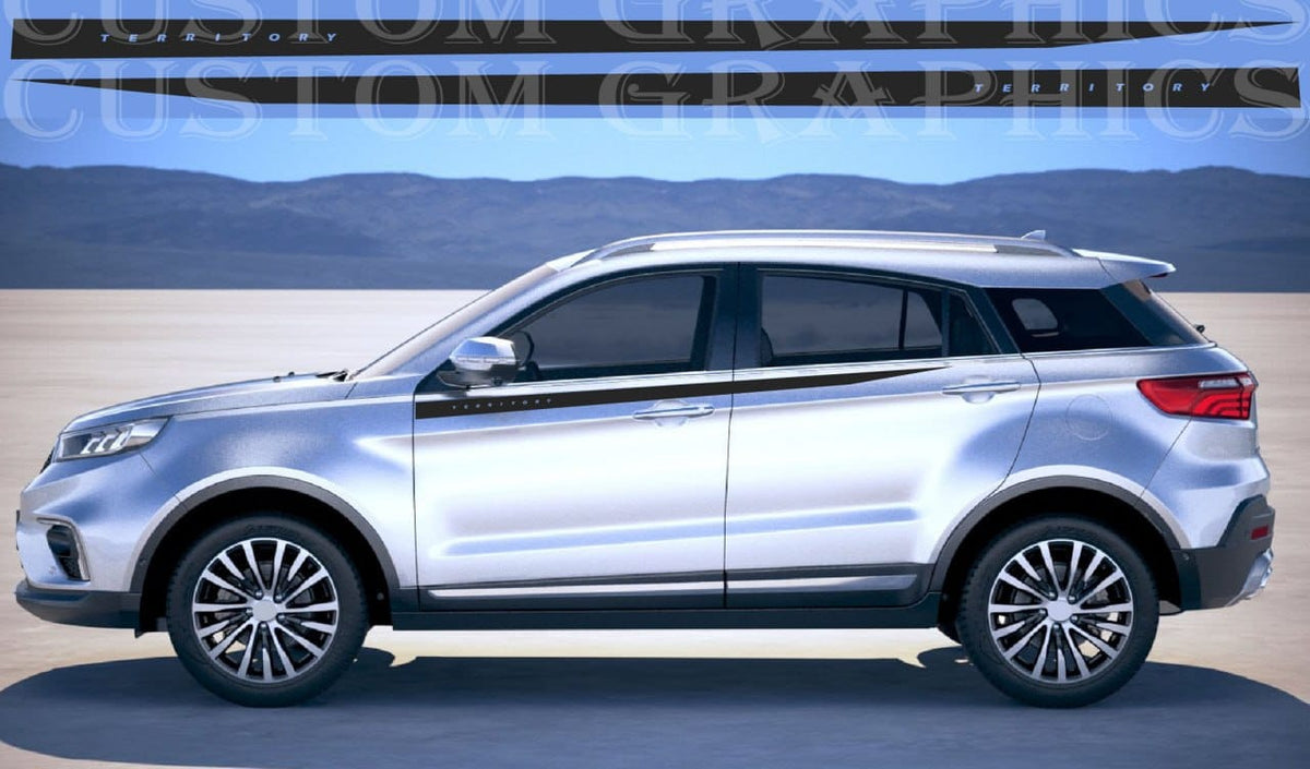 A silver SUV shown in a side profile view against a desert landscape backdrop with mountains in the distance. A watermark for 'Custom Graphics' is visible across the top.