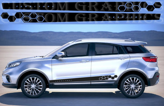 A silver SUV shown in side profile on a desert-like flat landscape with mountains in the background. The vehicle has black side graphics with a repeating hexagon pattern and small circular motifs along the lower side trim.