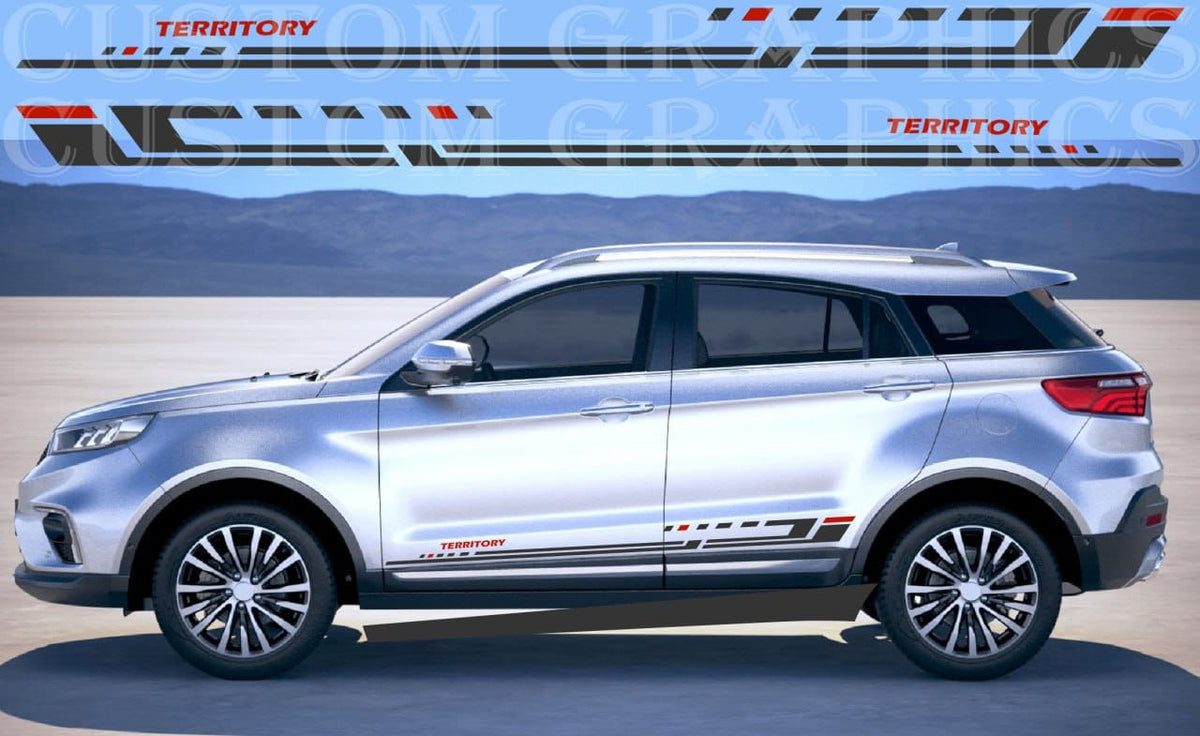 A silver SUV shown in side profile on a desert-like surface with mountains and a blue sky background. The image includes a large semi-transparent watermark reading 'TERRITORY' and 'GTRACING' across the top, and matching side decals are displayed above the vehicle.