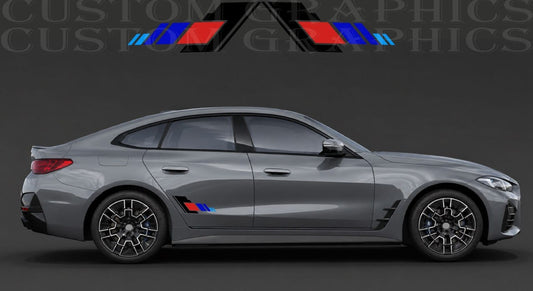A gray BMW sedan shown in side profile on a dark studio background, with a small blue, red, and black M-style side decal and a matching large logo graphic above the car.