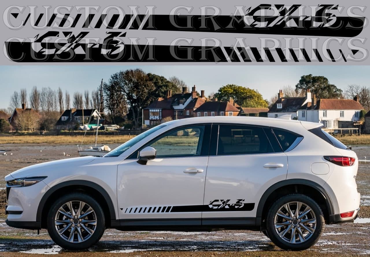 A white Mazda CX-5 with black vinyl stripes decals on the lower side, featuring the text 'Custom Graphics CX-5' on the top.