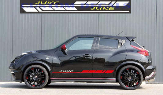 A black Nissan Juke hatchback with two-tone vinyl decals on the sides, featuring a design that includes the word 'JUKE' prominently displayed.